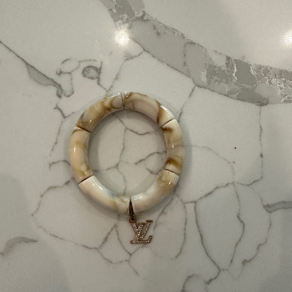 Bracelet with LV charm - Picture 1 of 2